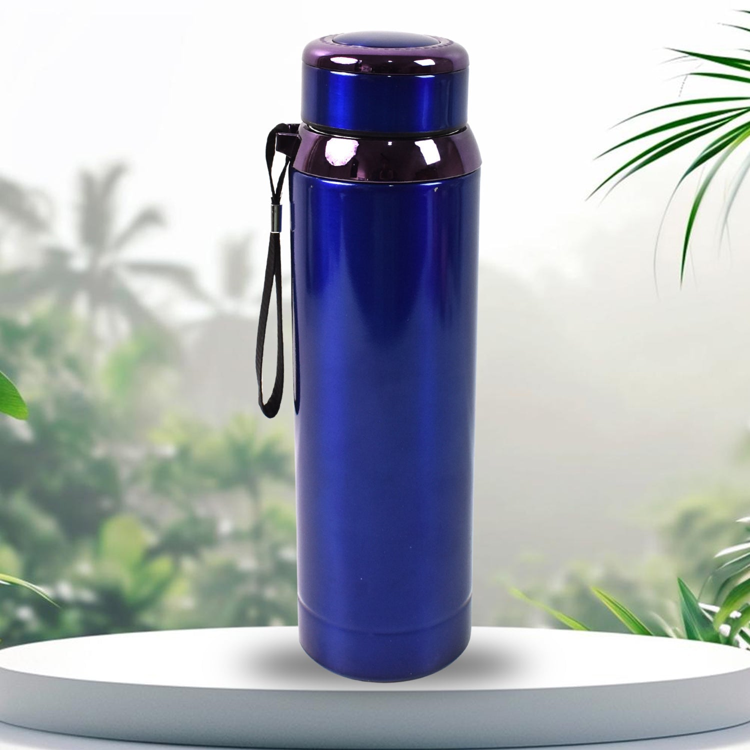 Outdoors view of stainless steel bottle in hand