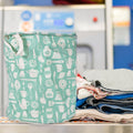 Organivo collapsible laundry bag with handles, perfect for dirty clothes storage.
