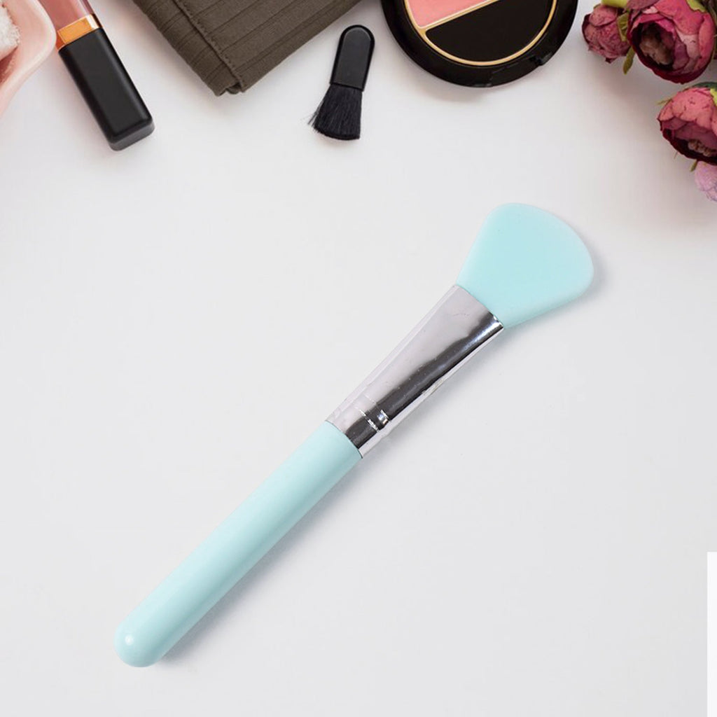 Compact silicone mask brush for travel-friendly skincare