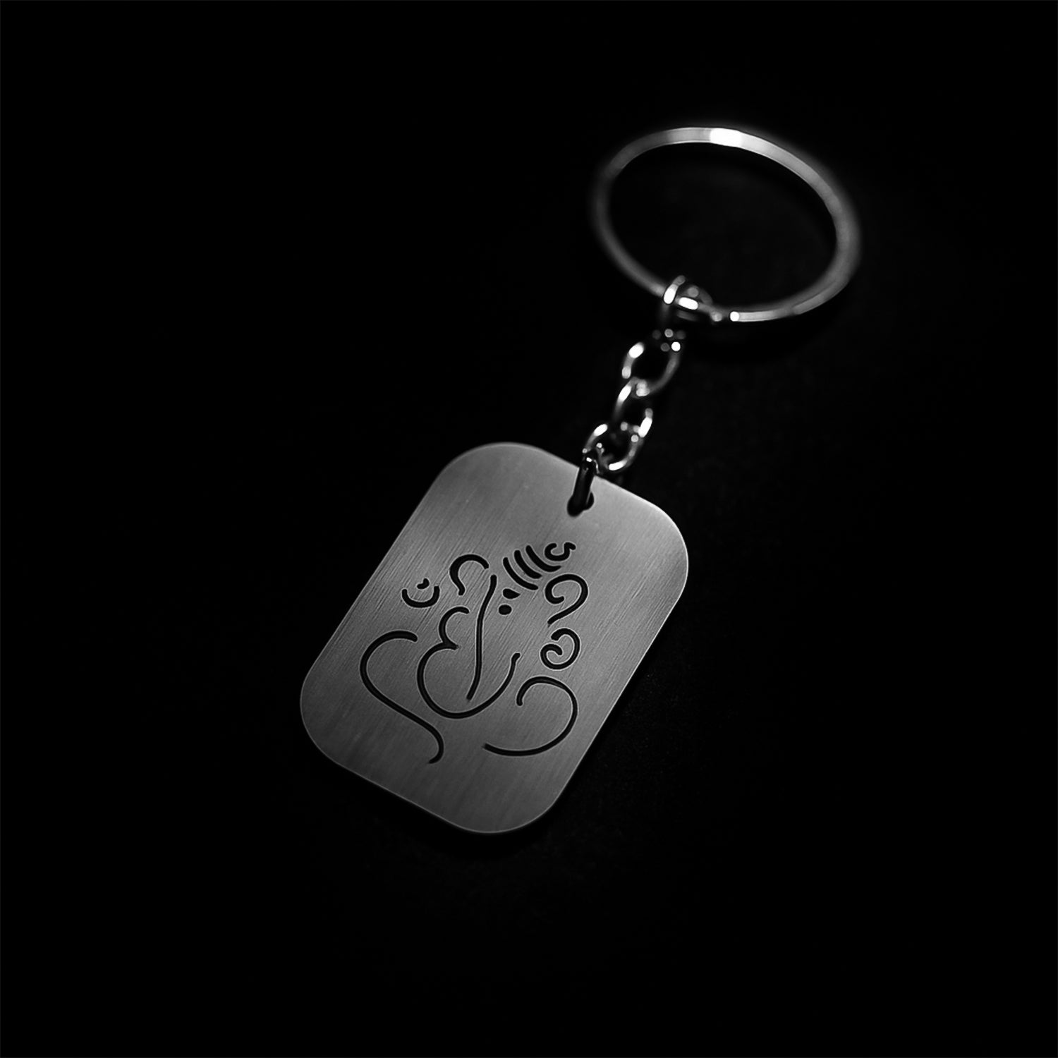 Divine Ganesh Metal Keychain featuring a sturdy chain and key ring for secure key holding.