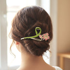 Decorative hair claw clip holding hair securely with floral accents