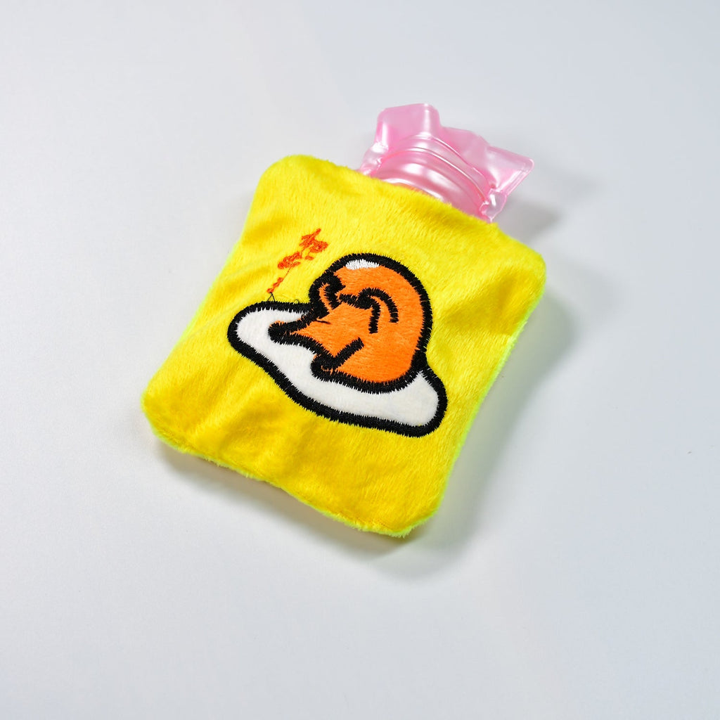 Bright yellow duck head hot water bag with a soft fabric cover for comfort.