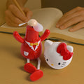 USB cartoon mini table fan with kitty character and red suit on desk