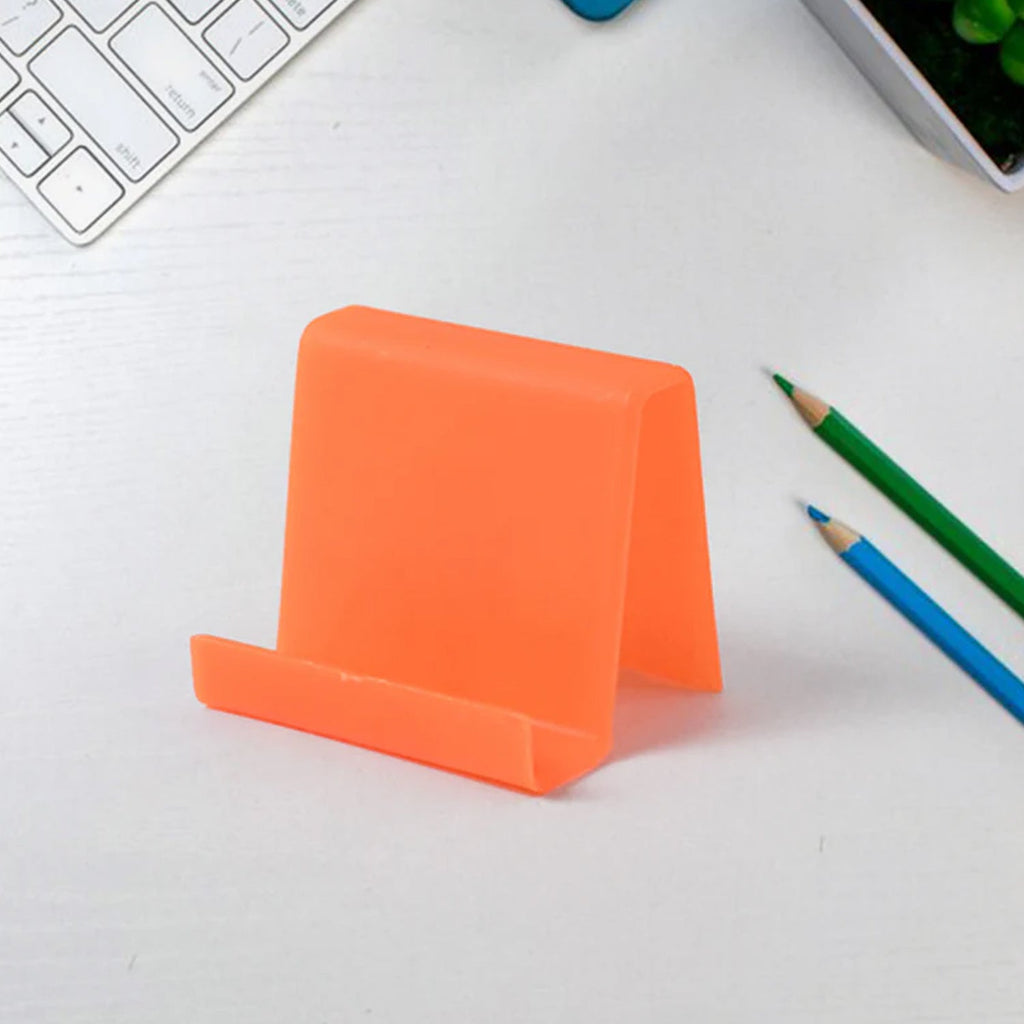 Compact plastic mobile phone stand set displayed on workspace