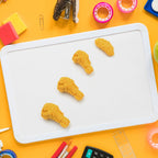 Another view of the chicken erasers in their retail packaging, highlighting their readiness as a gift.