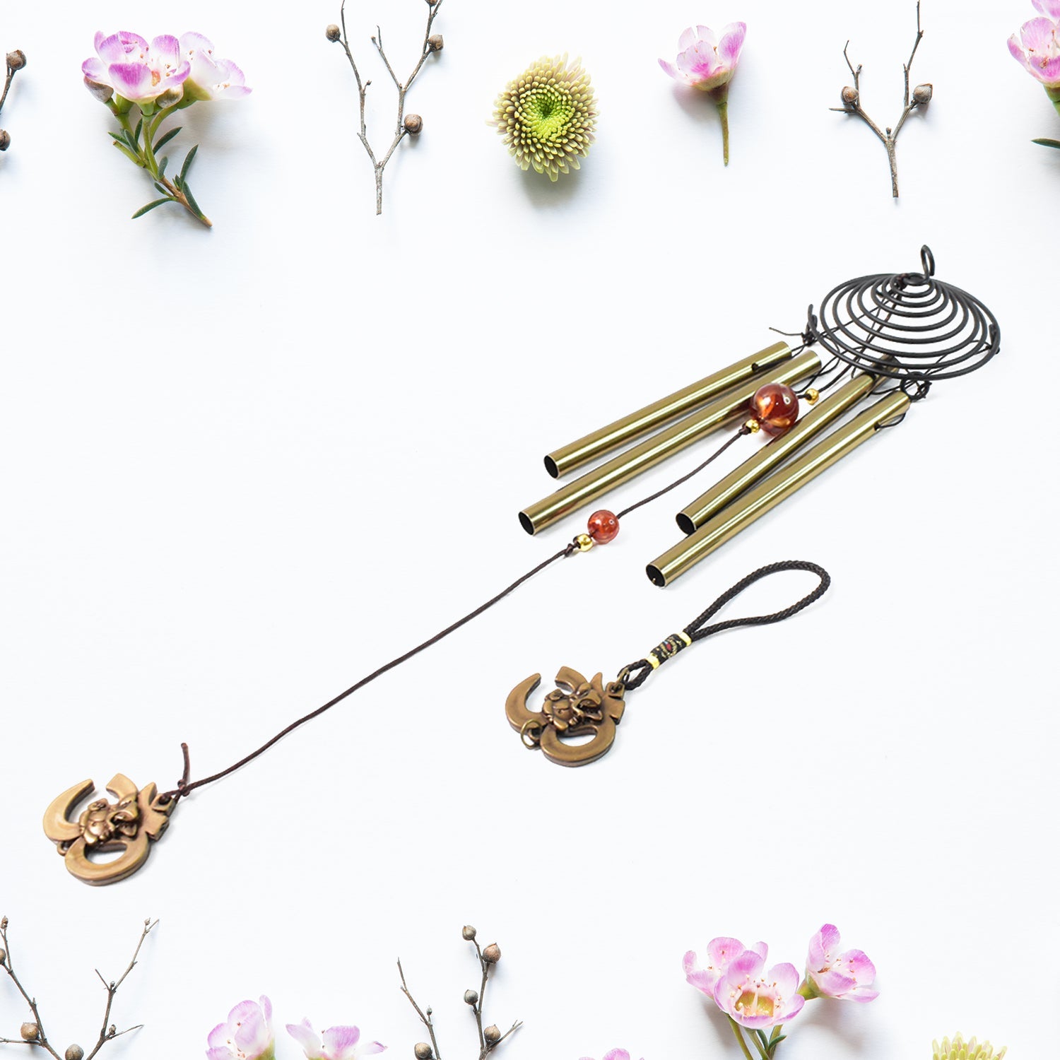 Colourful dragonfly wind chime producing soothing sounds in garden