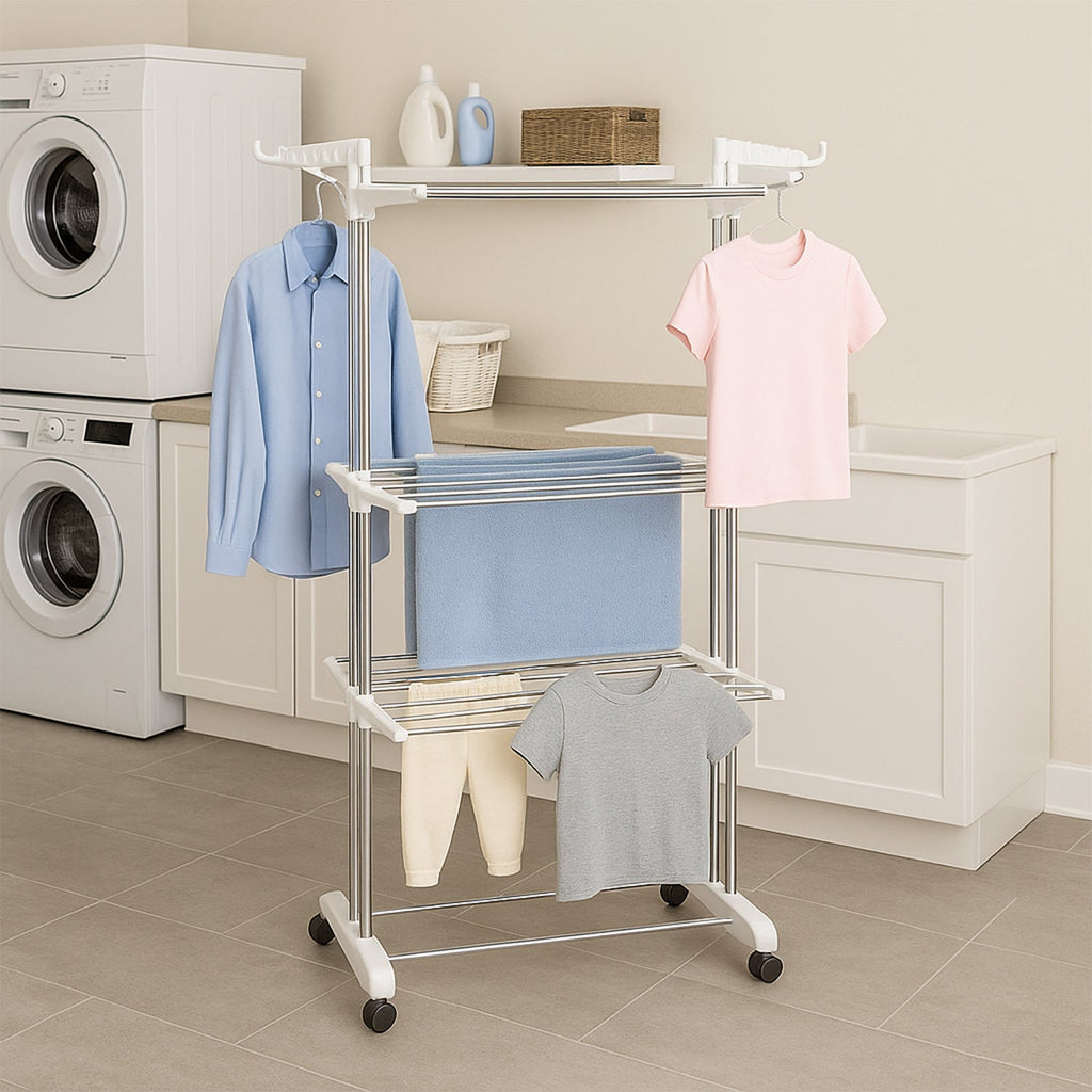 Urban home setting showcasing a multi-tier laundry rack with clothes drying.