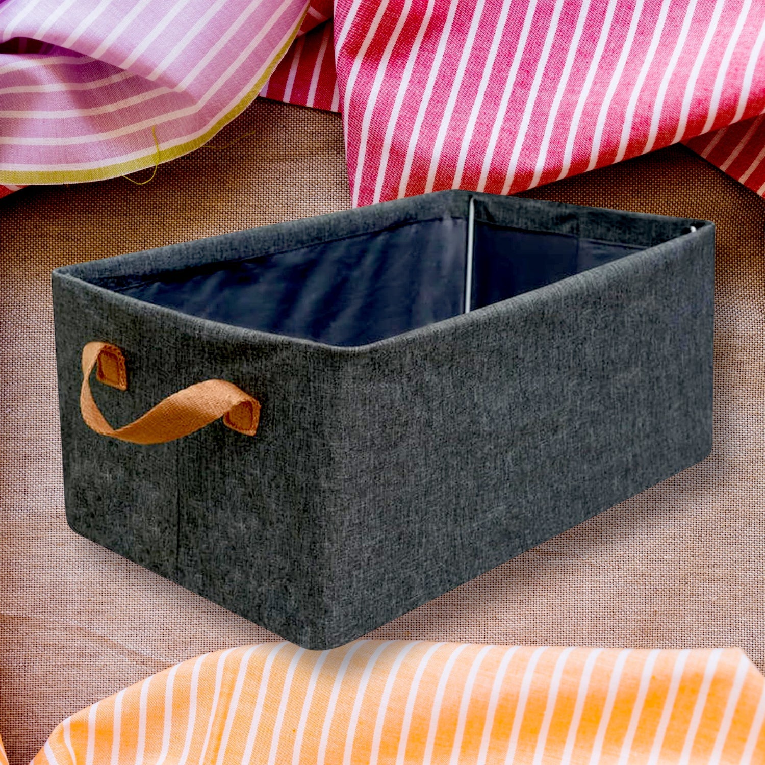 Close-up view of the sturdy handles and breathable cotton linen fabric of the storage box.