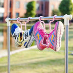 Side view of the hanging shoe organizer with a pair of shoes, demonstrating its stability.