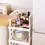 The foldable storage solution shown in a bedroom closet, neatly organizing clothes.