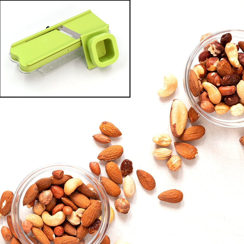 Side view showing the adjustable crank mechanism of the vegetable cutter.