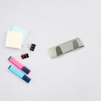 Pack of six self-adhesive hooks for organising home essentials.