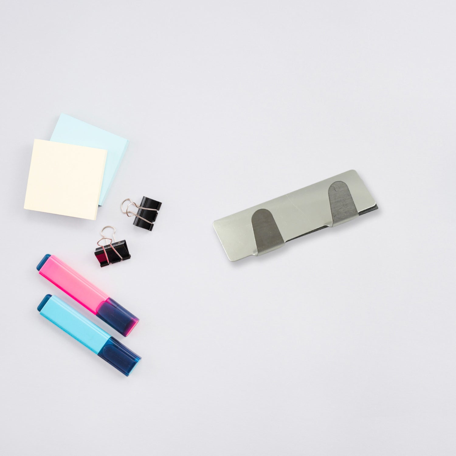 Pack of six self-adhesive hooks for organising home essentials.