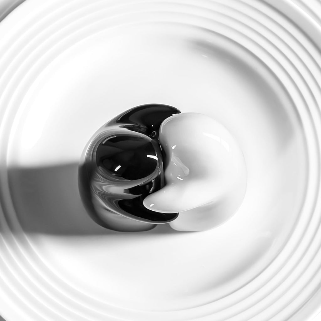 Black ceramic pepper shaker with sleek modern hugging design