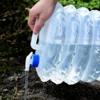 Space-saving folded collapsible water container, perfect for camping trips.