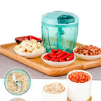 Top view of the manual vegetable chopper with its sharp, multi-blade design.