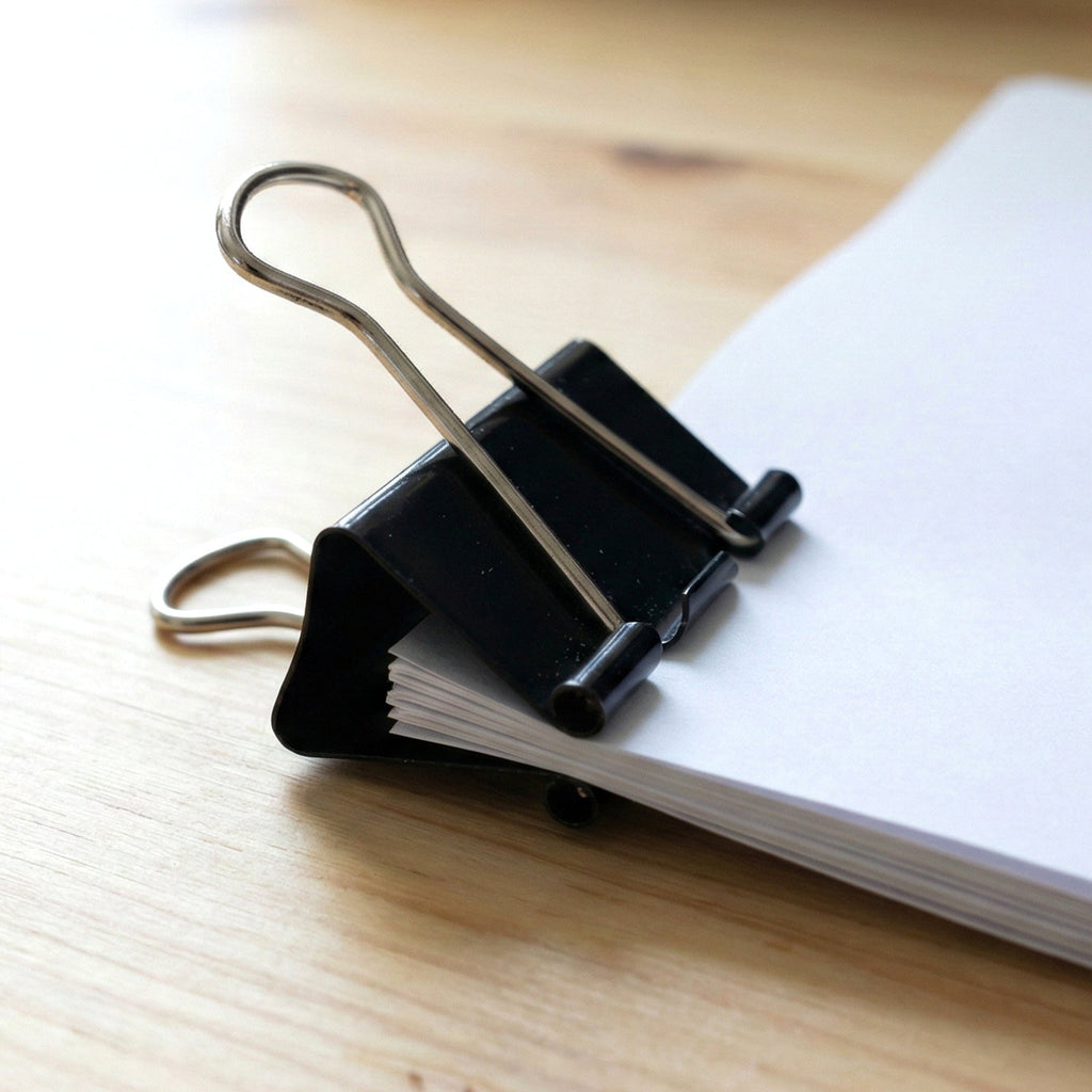 Sturdy office binder clips with rust-resistant black coating