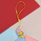 Mini chick-shaped push pop fidget toy with yellow hanging strap for stress relief