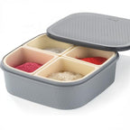 A vibrant sweet box filled with an array of dry fruits and chocolate delights.