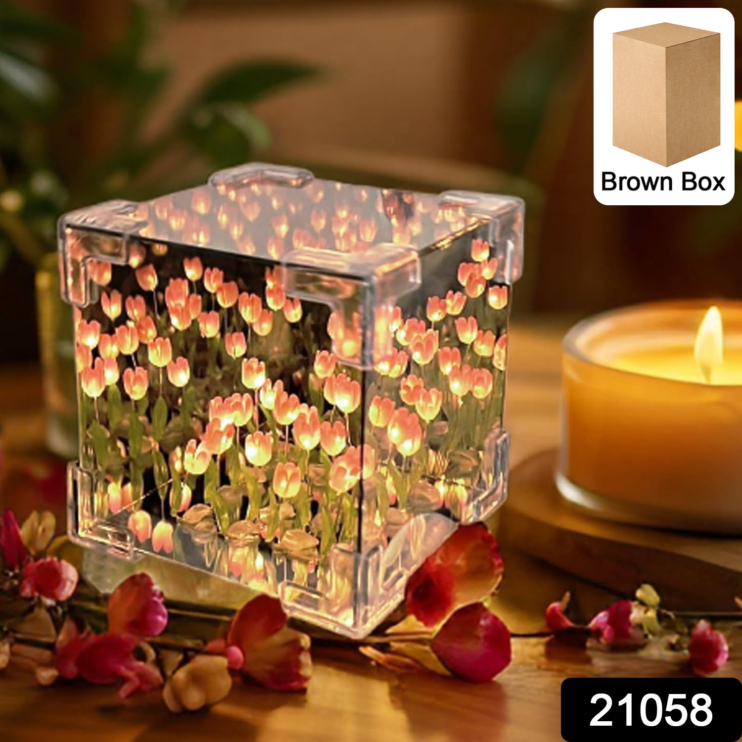 Transparent cube lamp showing glowing tulip flower pattern in soft LED light