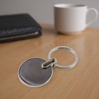 Stylish black round keychain for organizing keys and bag charms
