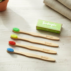 Pack of 4 bamboo toothbrushes for adults with included cotton buds