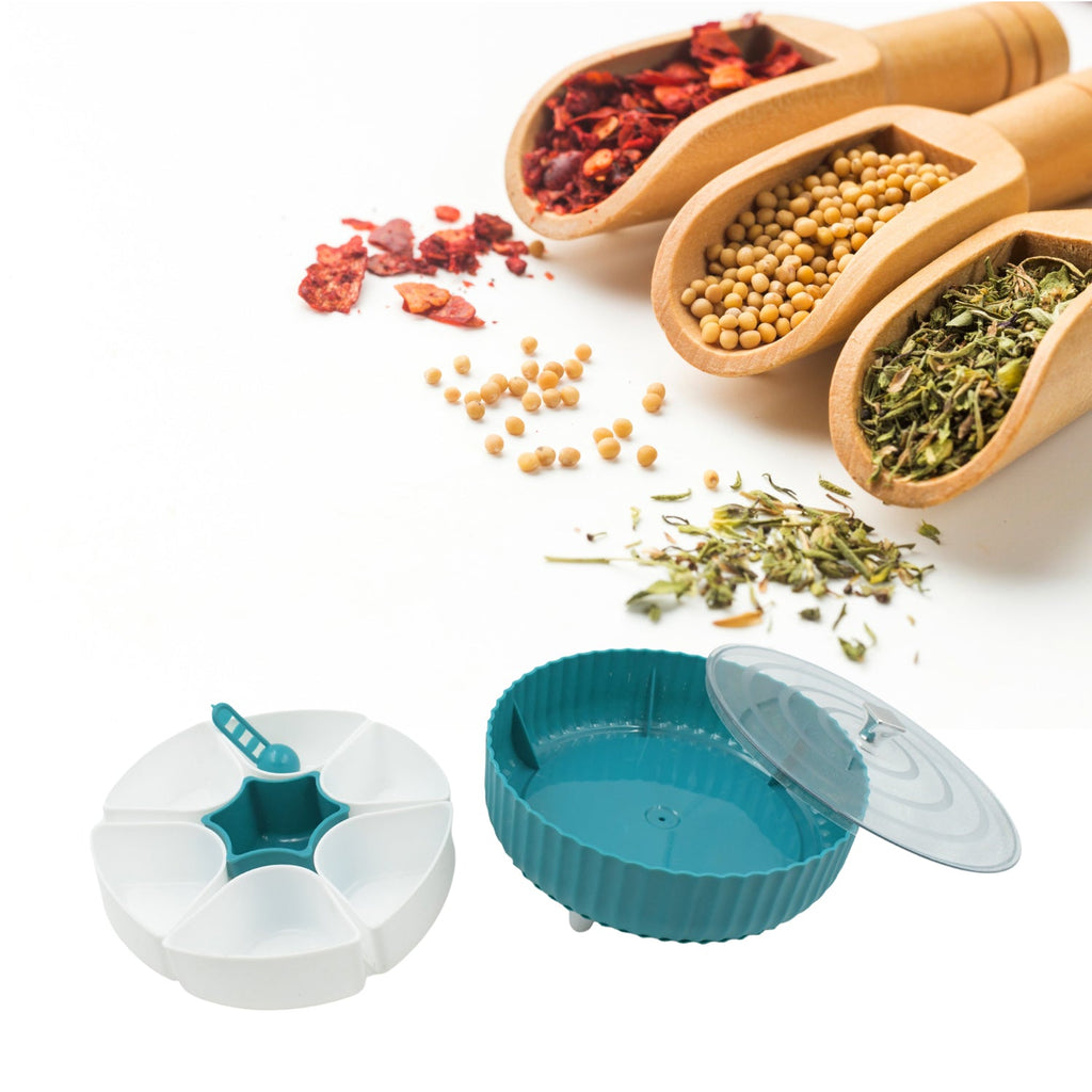 A 360-degree revolving box efficiently storing an assortment of snacks and dry fruits.