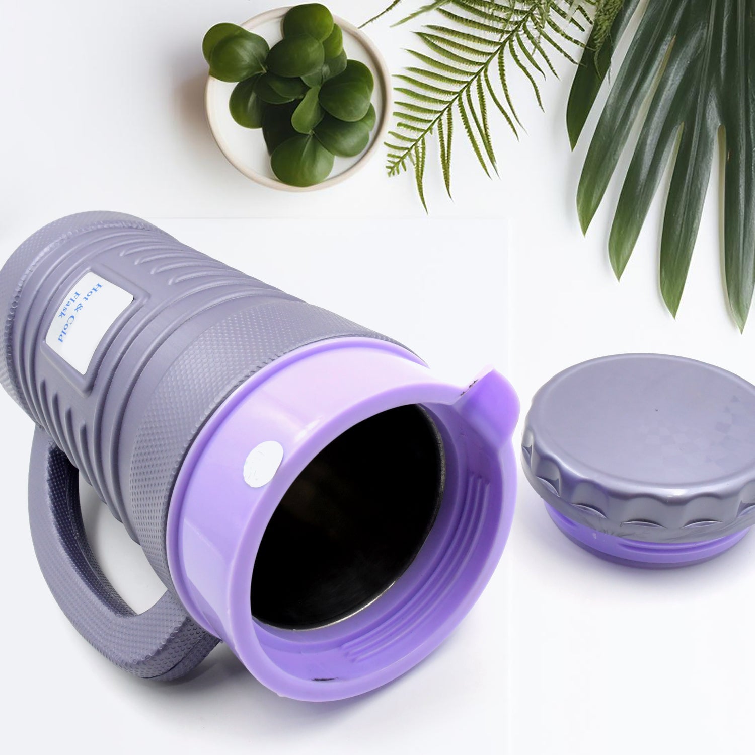 Side view of the Nekza insulated flask, showcasing its sleek design.