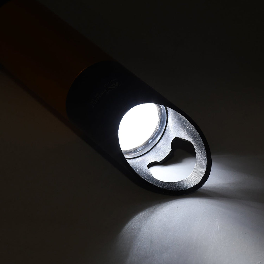 Mini LED torch illuminating a dark space, demonstrating its high lumen output.