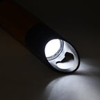 Mini LED torch illuminating a dark space, demonstrating its high lumen output.