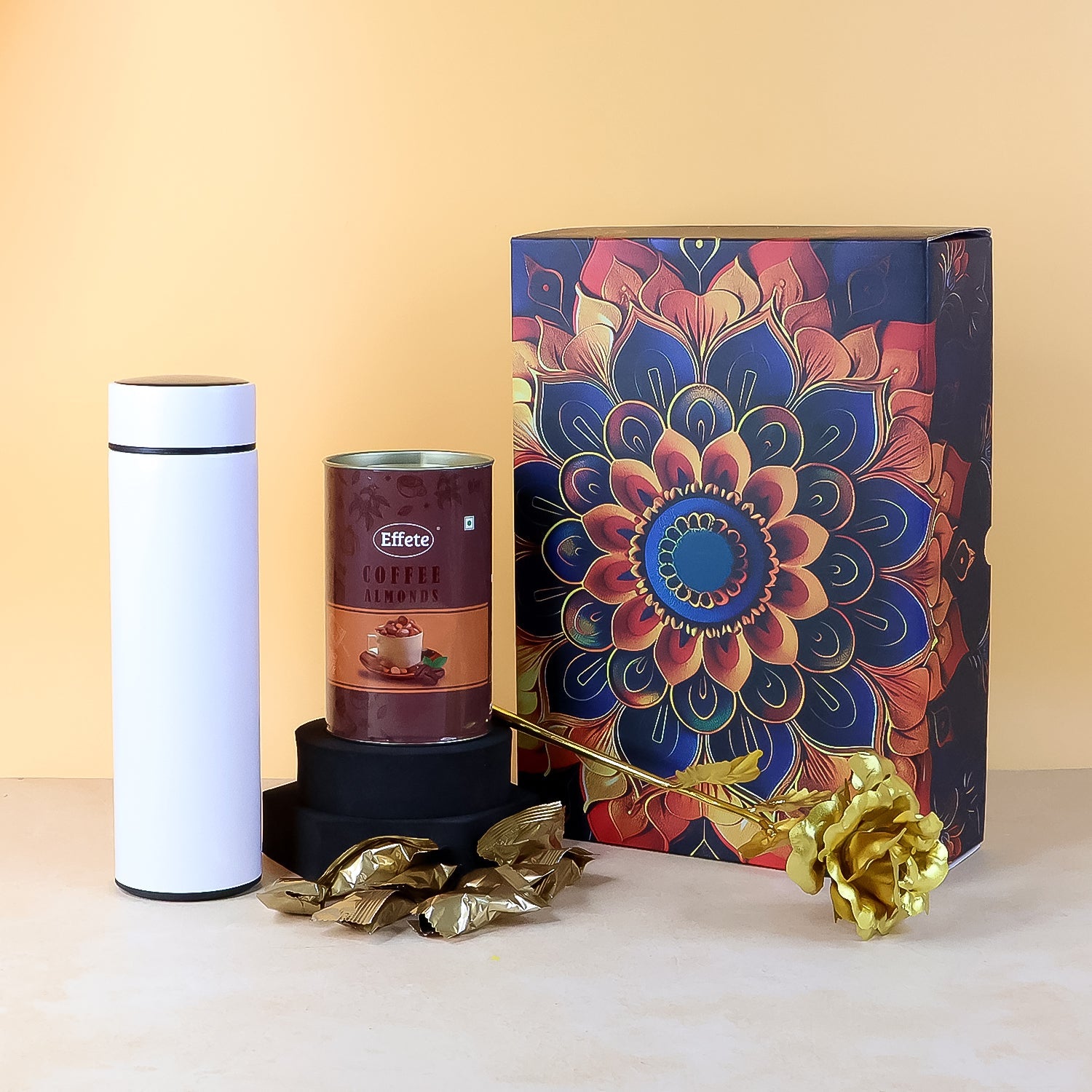 Premium coffee almonds gift pack with decorative golden rose and water bottle