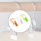 Hanging hook clip holding cloth securely using strong grip mechanism
