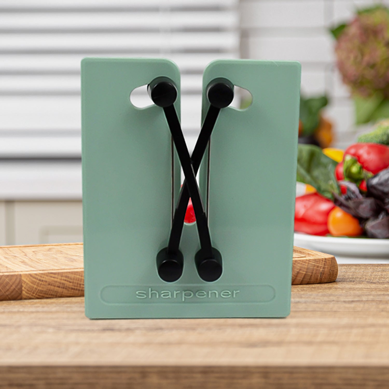 Side view of the versatile kitchen knife sharpener with sharpening slots.