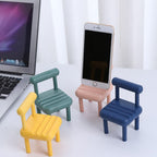 Front view of the empty Mini Chair Phone Stand, ready to hold any smartphone.