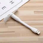 The LED USB light and mini USB fan shown separately, emphasizing their compact size for portability.