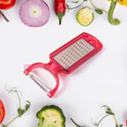 2-in-1 kitchen peeler and grater peeling a carrot effortlessly with stainless steel blades