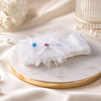 Comfortable floral baby headband worn on a baby's head
