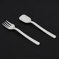 A pack of Quickslice disposable plastic forks and spoons, ideal for party supplies.