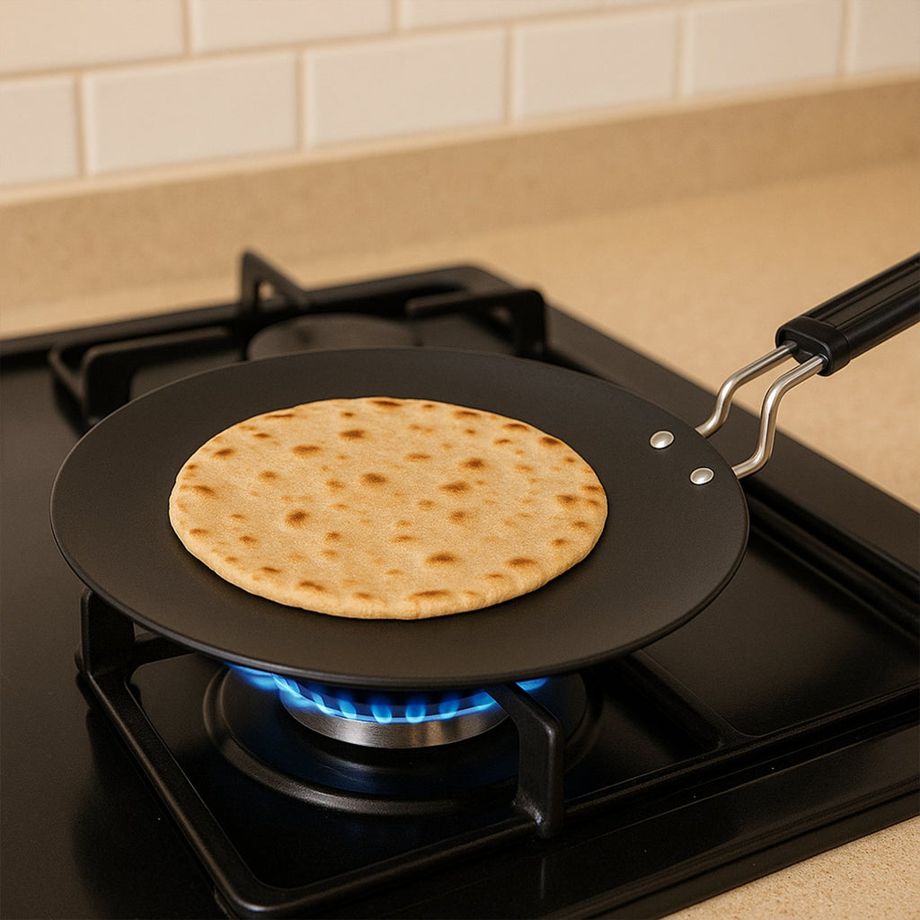 Side profile of flat tawa showing heat-resistant handle