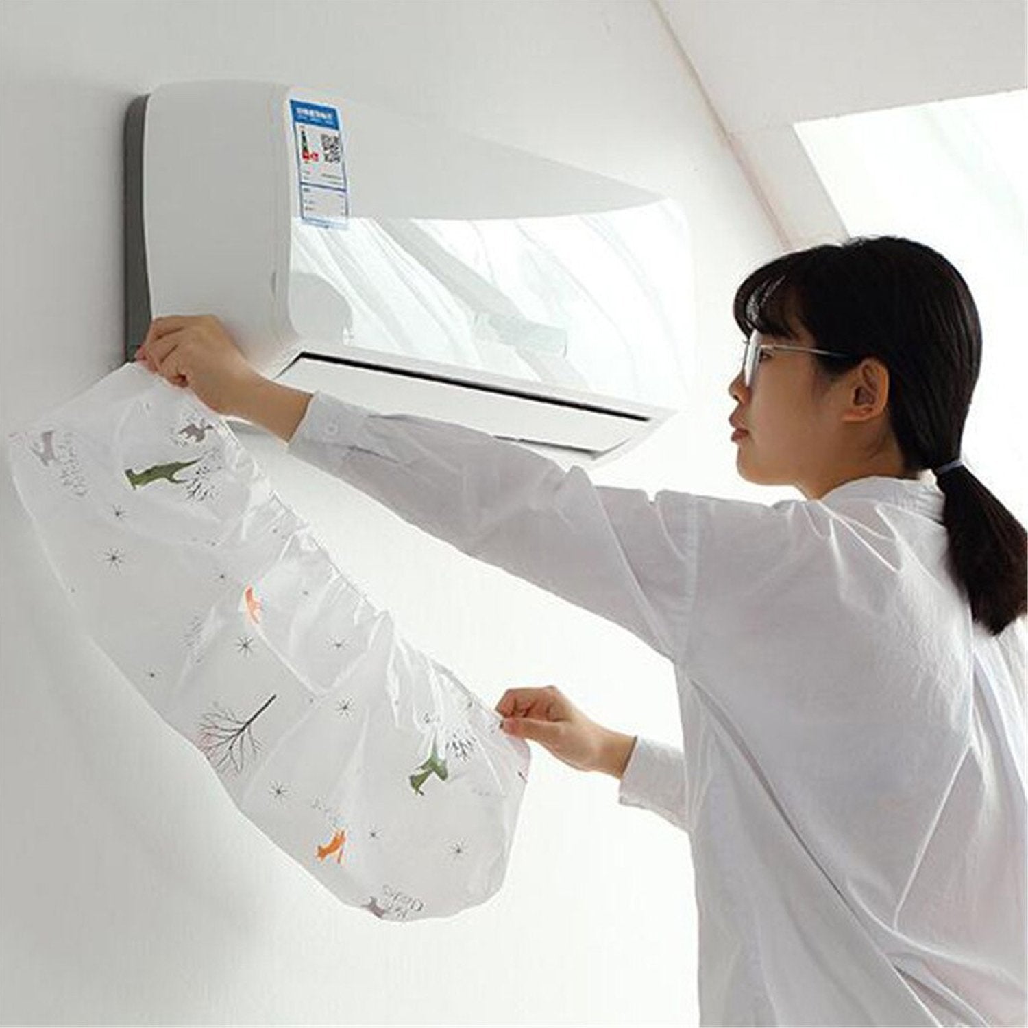 Foldable AC cover neatly stored, highlighting its compact design.
