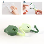 Mounted self adhesive round wall hooks on a smooth, clean surface