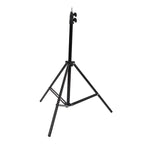 Sturdy DSLR camera tripod in a studio setting, perfect for professional photo and video.