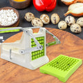 Stainless steel French fry cutter on a kitchen counter, ready for use.