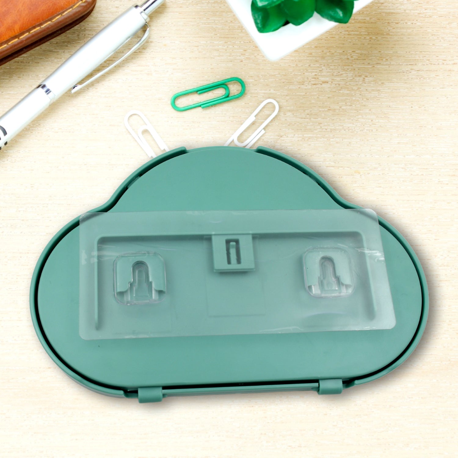 Back view of the waterproof mobile stand, highlighting its adhesive base.