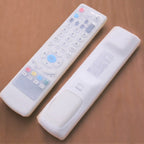 Clear DISH TV remote cover securely fitted over a set-top box remote control.