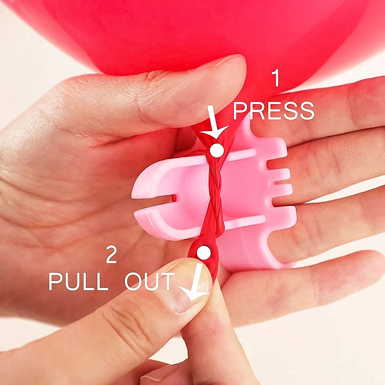 Balloon tying tool set in use for quick balloon assembly
