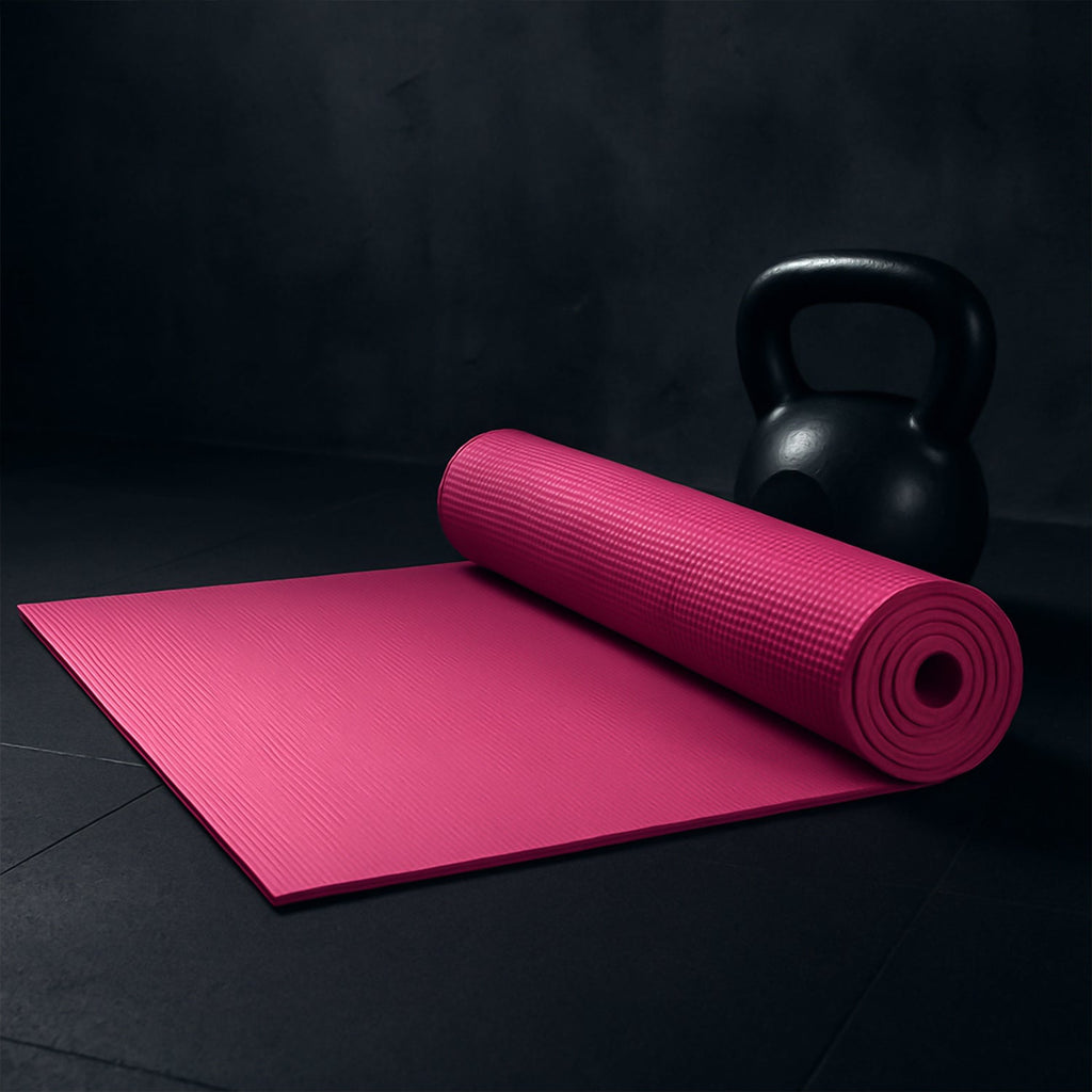 Full view of the non-slip yoga mat laid out on a gym floor.