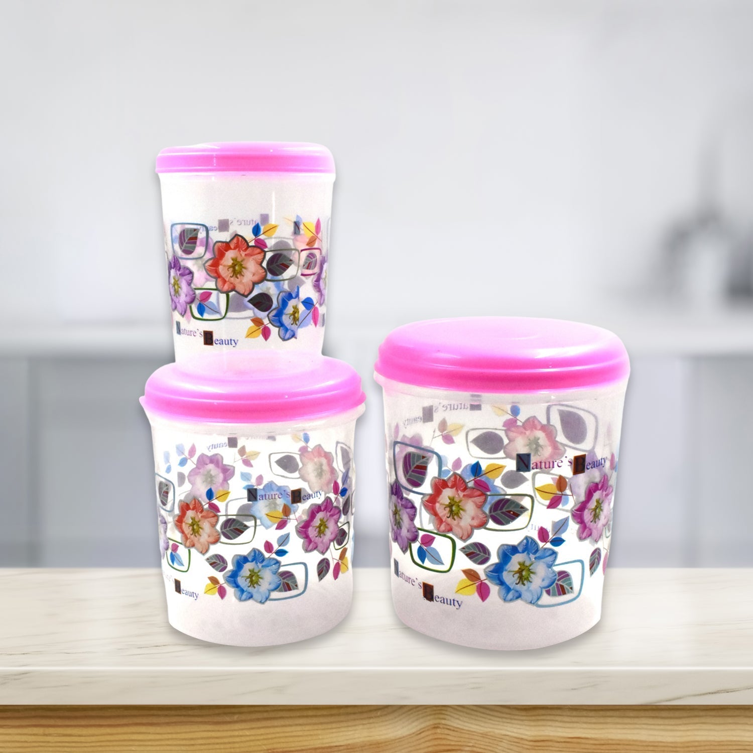 Three plastic storage containers, ideal for organizing items in a home or office setting.