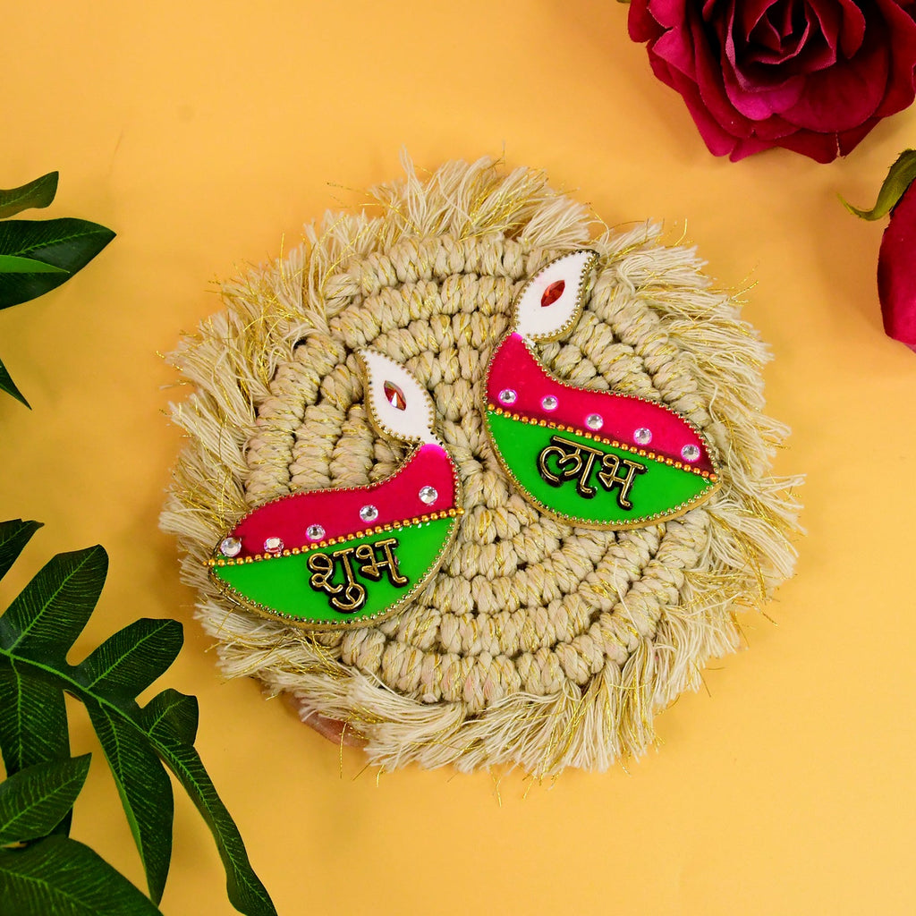 Traditional decorative diyas labeled Shubh and Labh for auspicious home décor