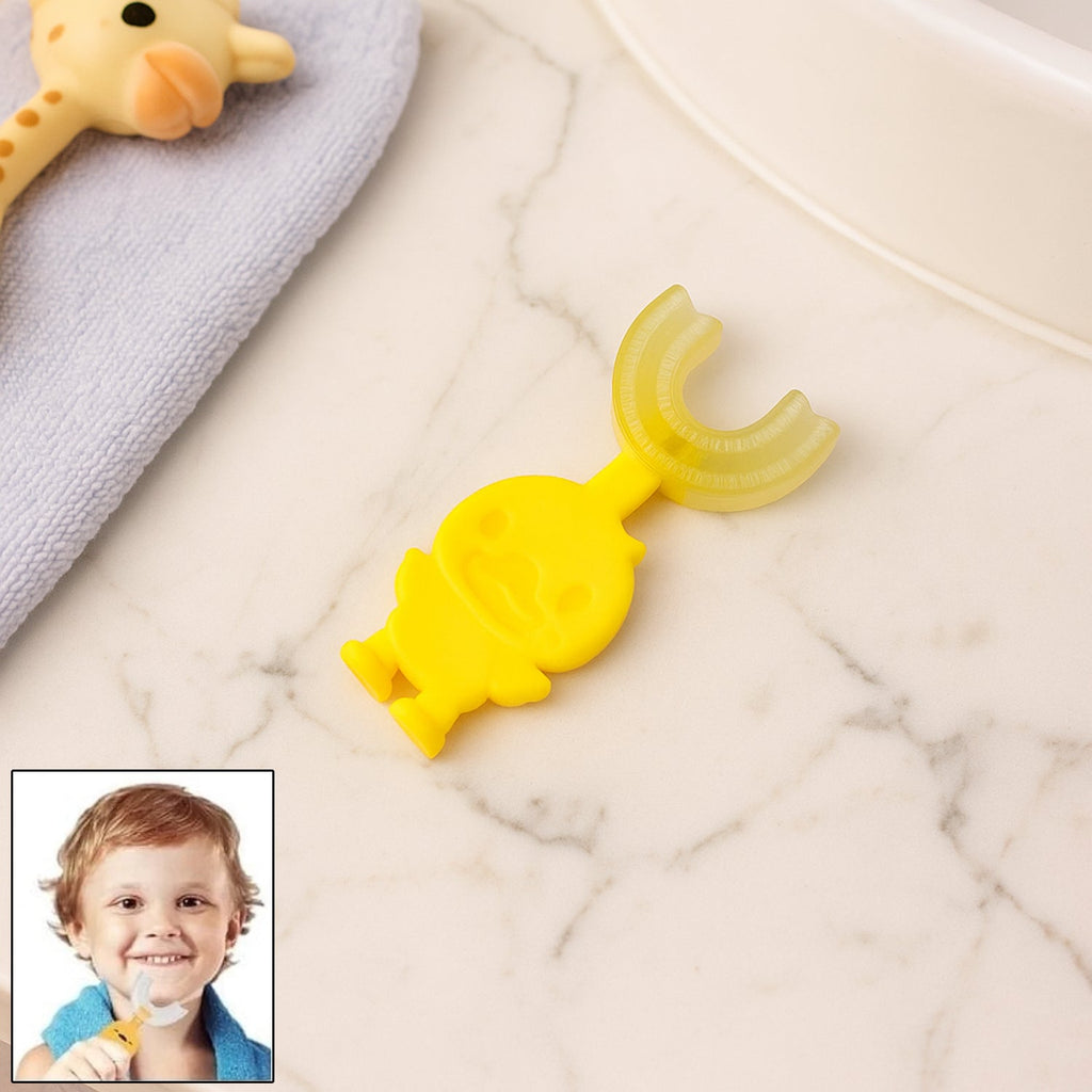 Baby toothbrush shaped like a cute cartoon duck with soft silicone bristles